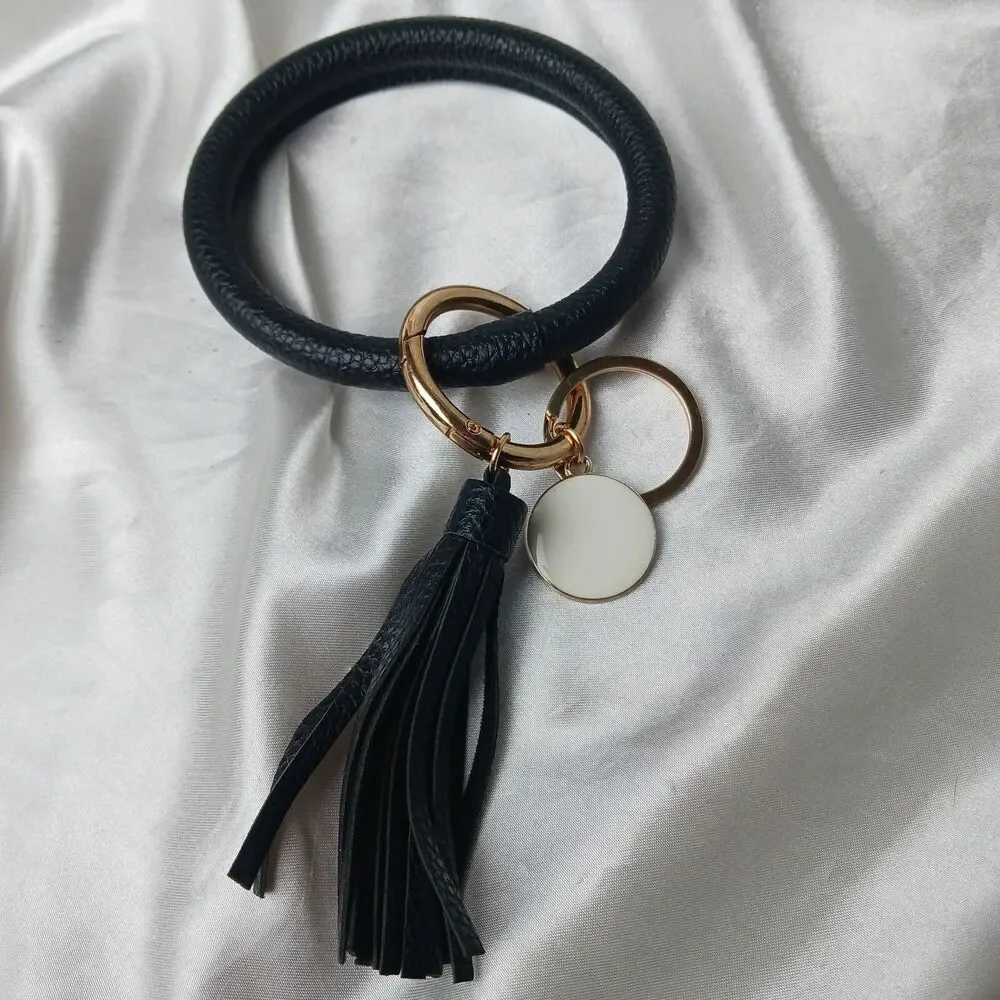 BLACK BRACELET KEYCHAIN WITH TASSEL